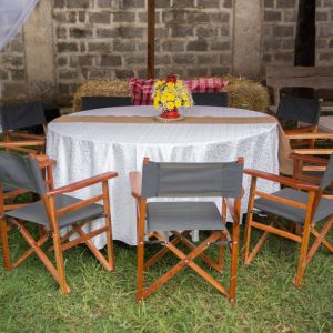 safari chairs gold lantern with floral as centrepiece and burlap runner urban live events FILEminimizer 1